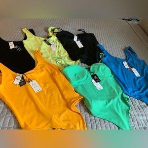 Express Large body suits multiple colors